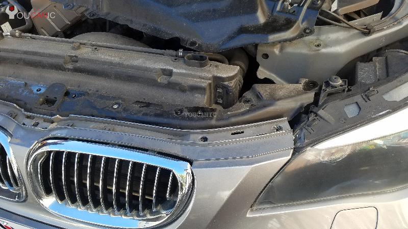 remove grill from bmw place top radiator support on the engine