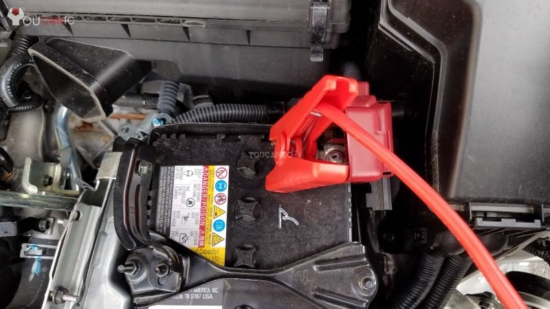 instruction on how to jump start Nissan Quest with dead battery