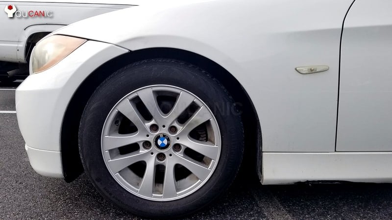 emove tire to replace tie rod on BMW 3-Series