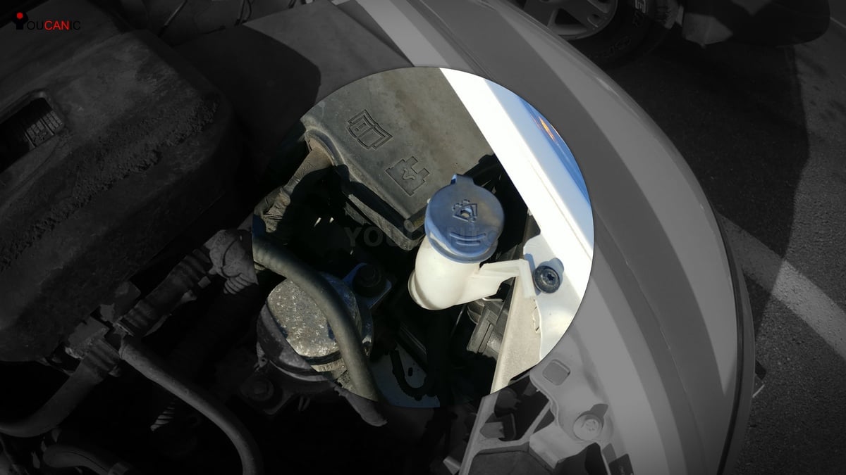 location of windshield washer fluid reservoir on a volvo