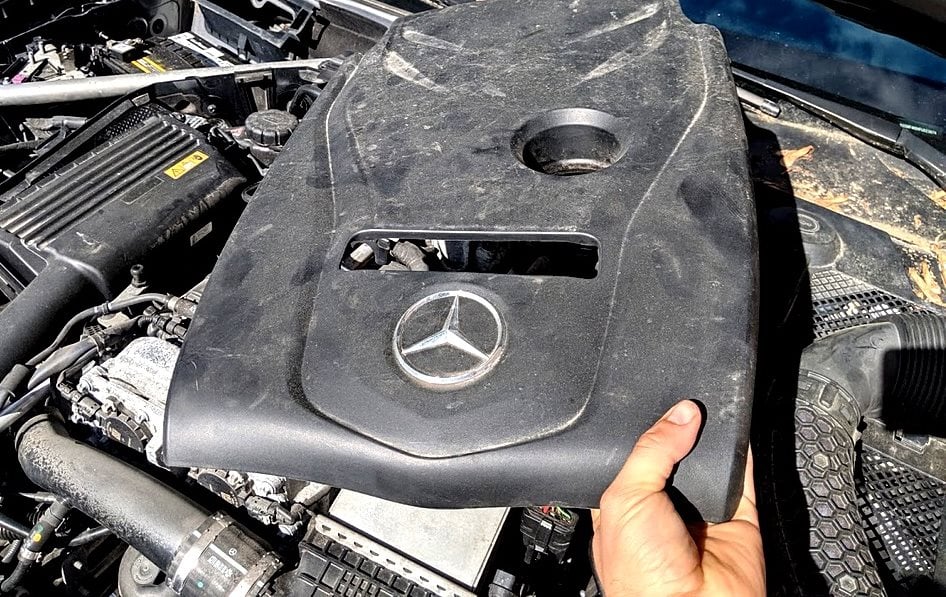 remove Mercedes engine cover