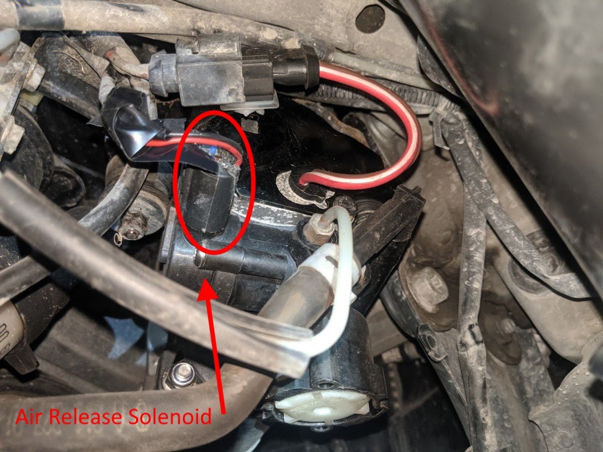 remove air suspention air release valve wire harness