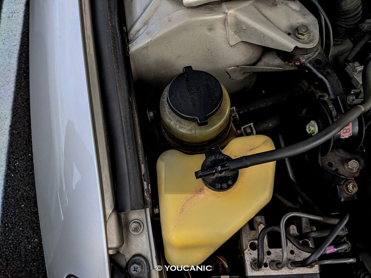 Locating coolant reservoir in Lexus car