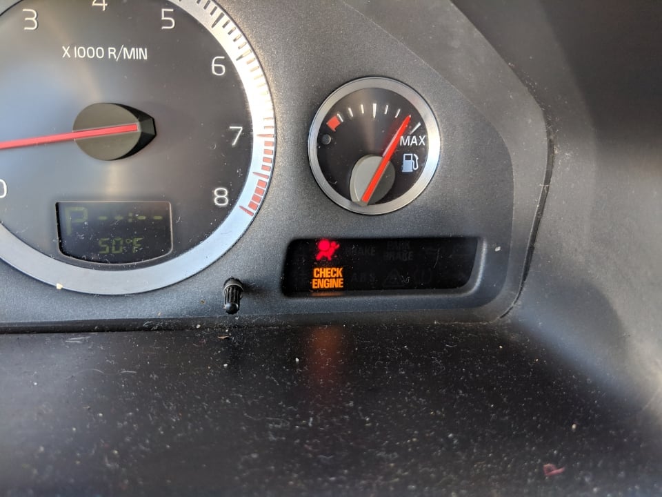 volvo check engine light on due to bad spark plugs