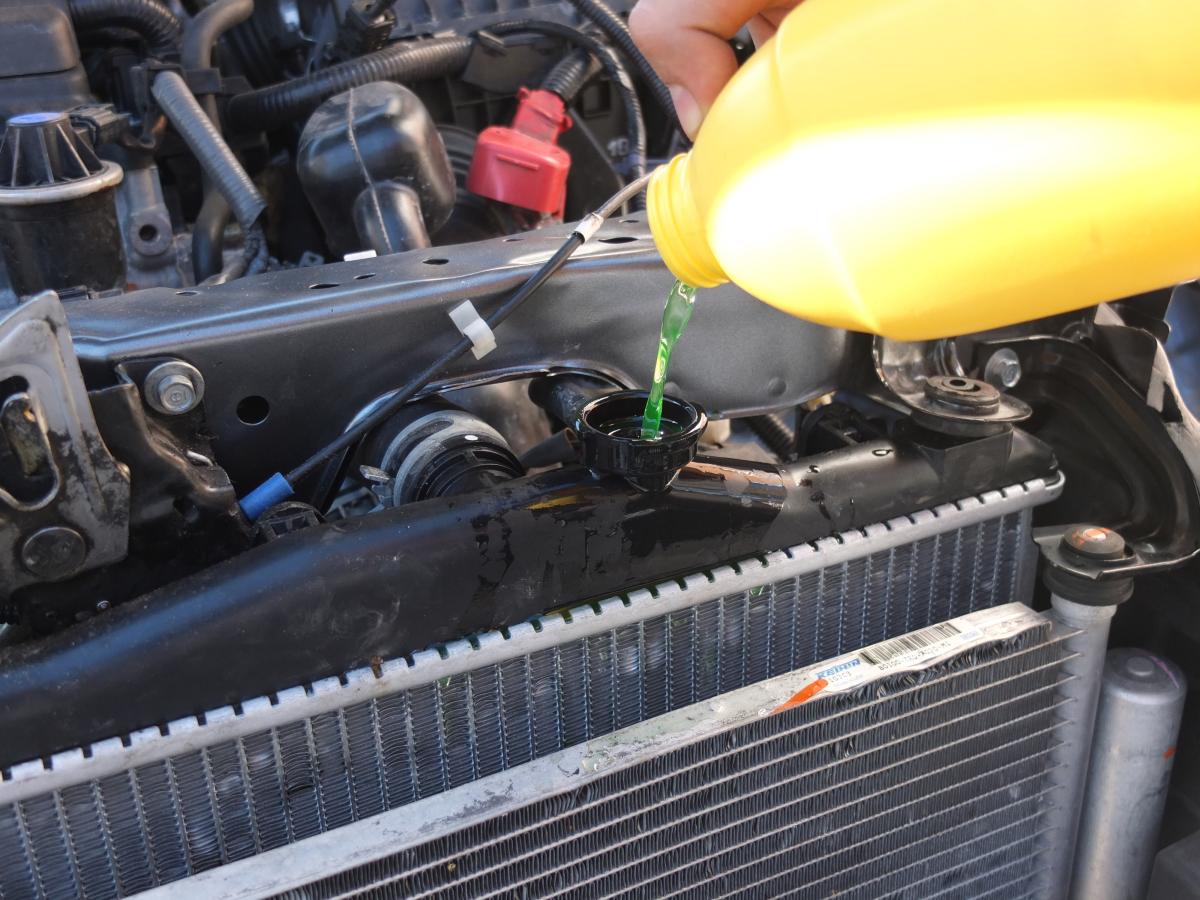 Add engine coolant to fix engine overheating