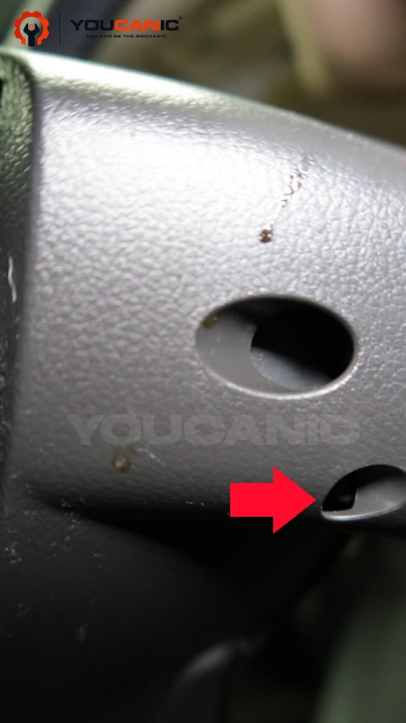 Mitsubishi airbag release hole