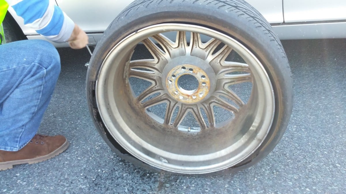 damaged tire rim due to driving with tpms light on