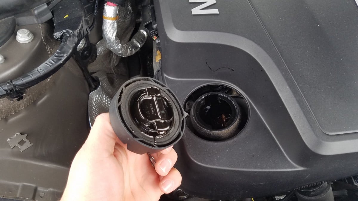 remove bmw oil cap if level is low