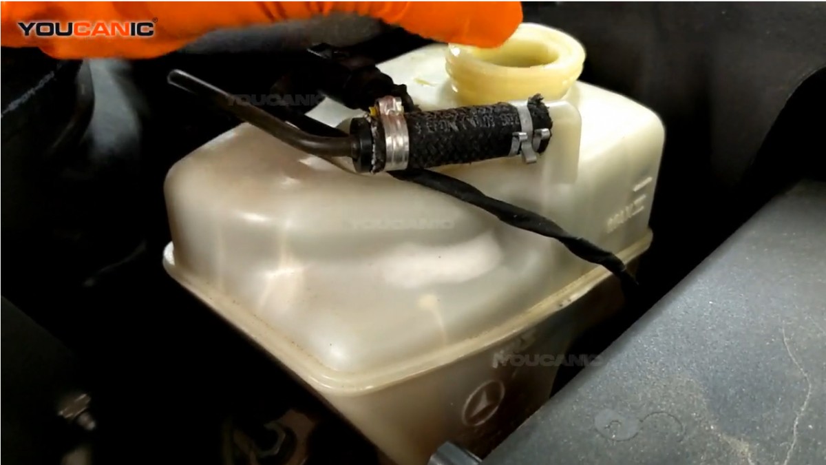 Adding brake fluid on the Mercedes-Benz SL Class.
