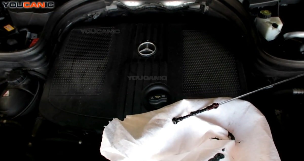 Checking the engine oil level of the Mercedes Benz GLK-Class.