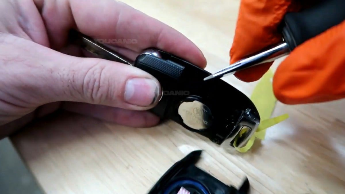 Removing the cover of the key fob.