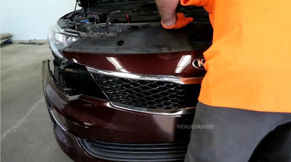 Removing the front bumper of the 2016-2020 Kia Optima.
