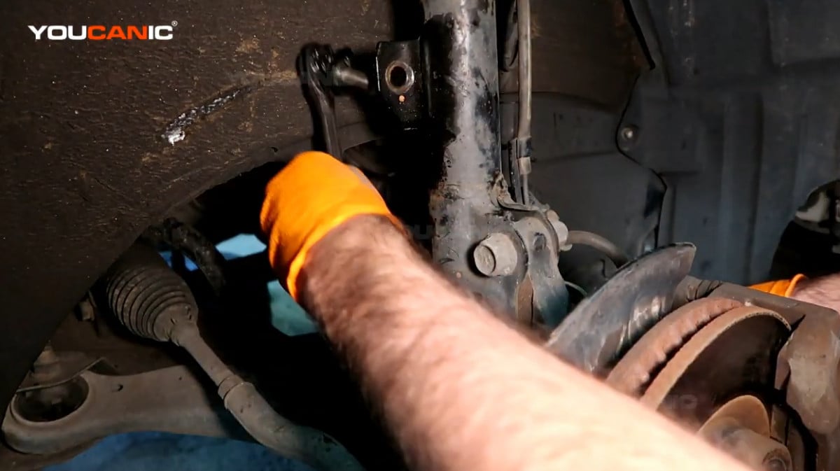 Removing the sway bar link.