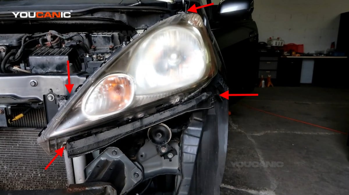 The location of the bolts holding the headlight assembly.