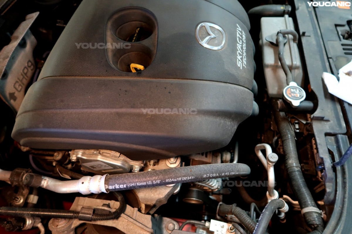 The engine cover of the Mazda 3.