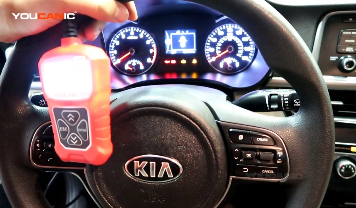 Connecting the OBD-II Scanner and Turning the Ignition Switch to Accessories.