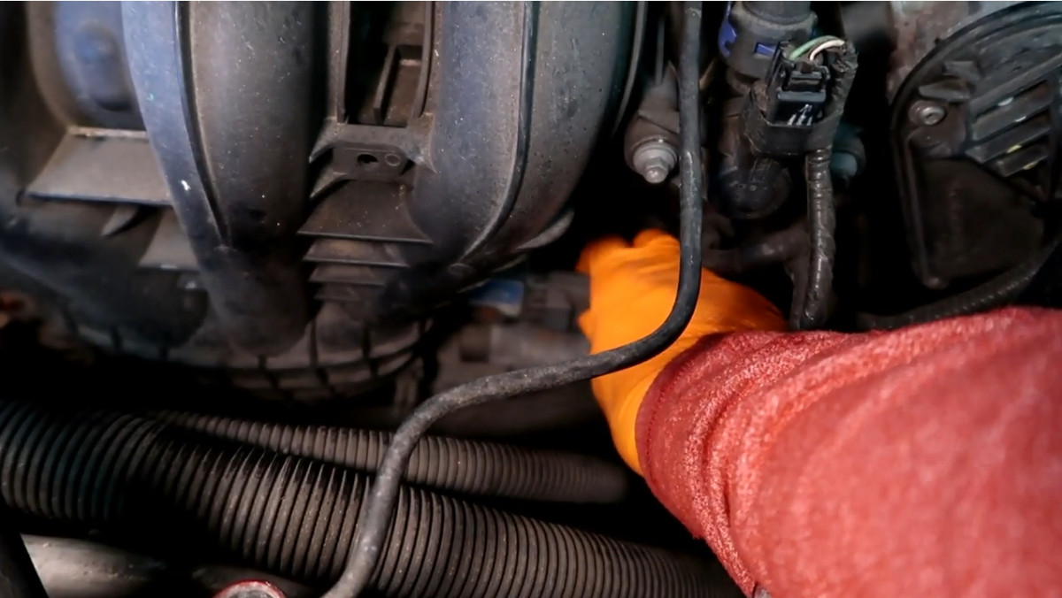 Disconnecting the electrical connector of the Manifold Pressure Sensor.