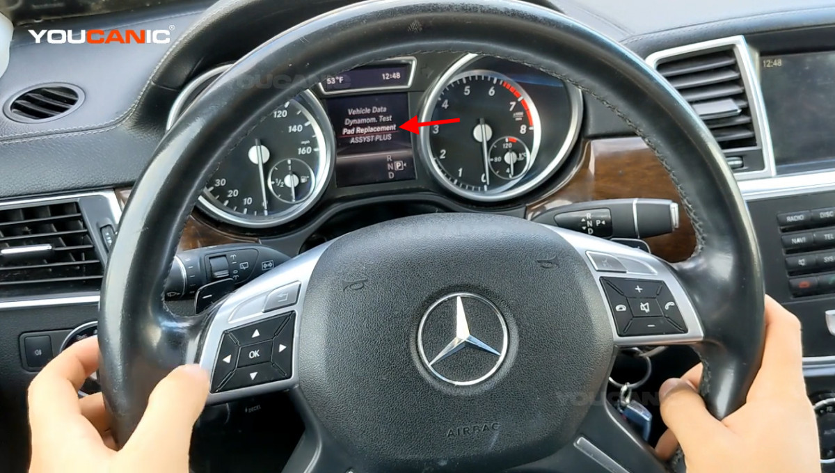 Releasing the parking brakes of the Mercedes-Benz.