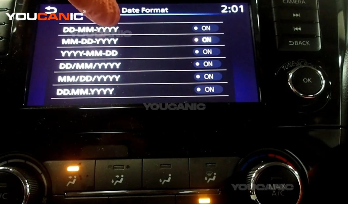 Date Format Menu on the Vehicle's Car Stereo.