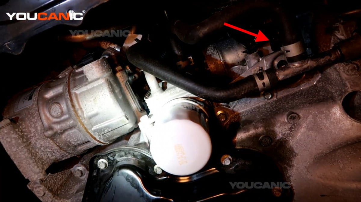 The location of the crankshaft position sensor on the Nissan Sentra.